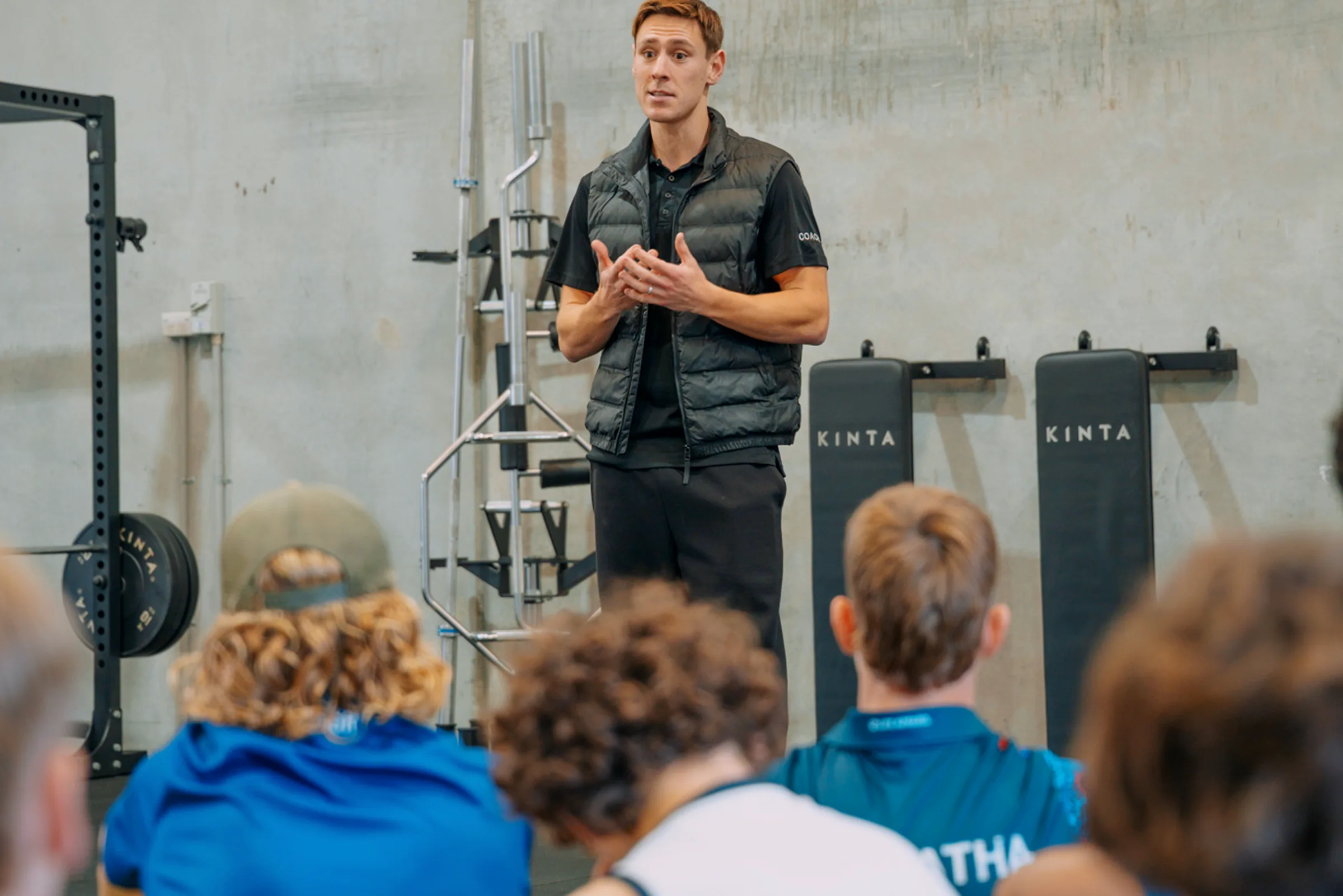 Rhett presenting to a group on the floor