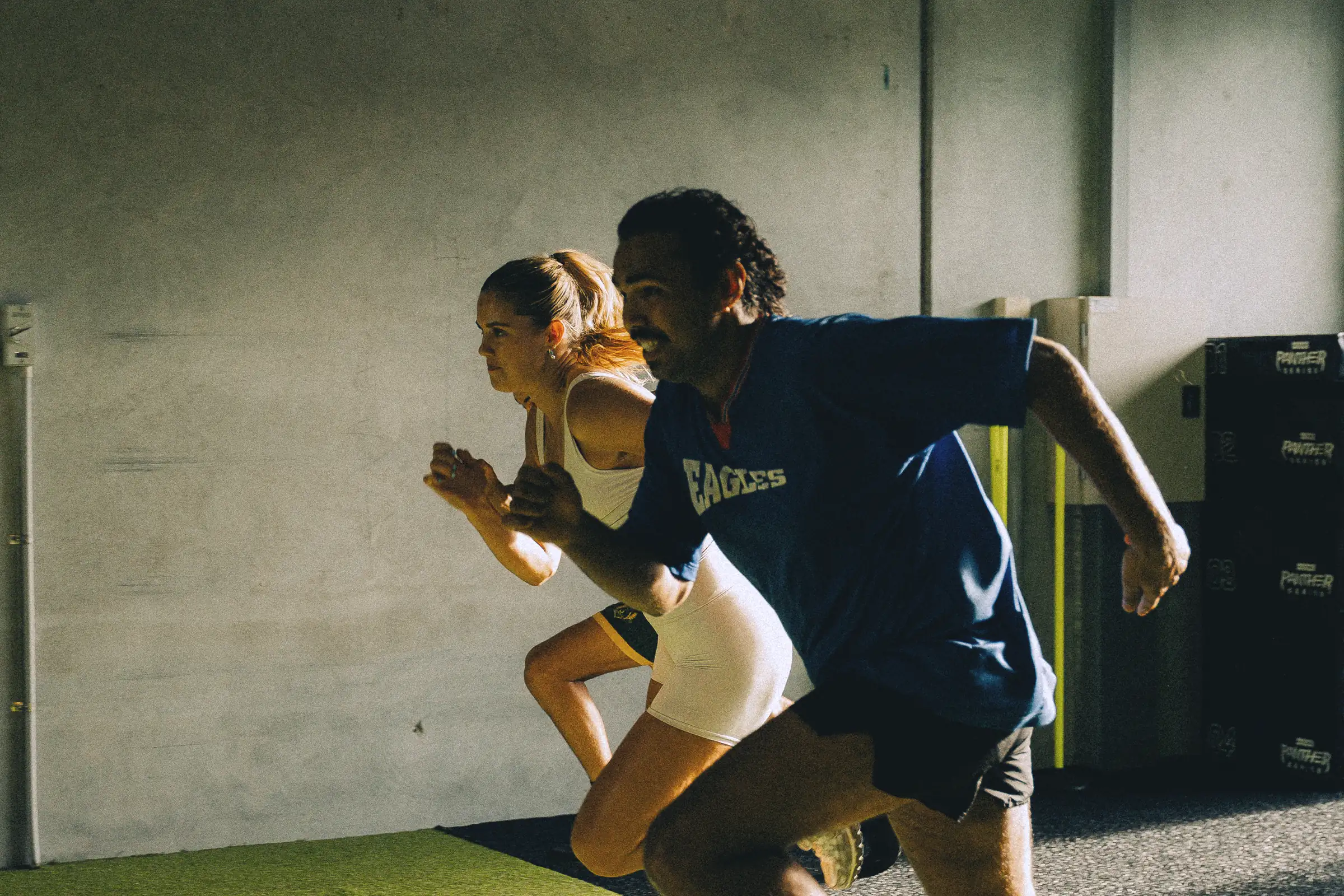 A small group with a coach on the track
